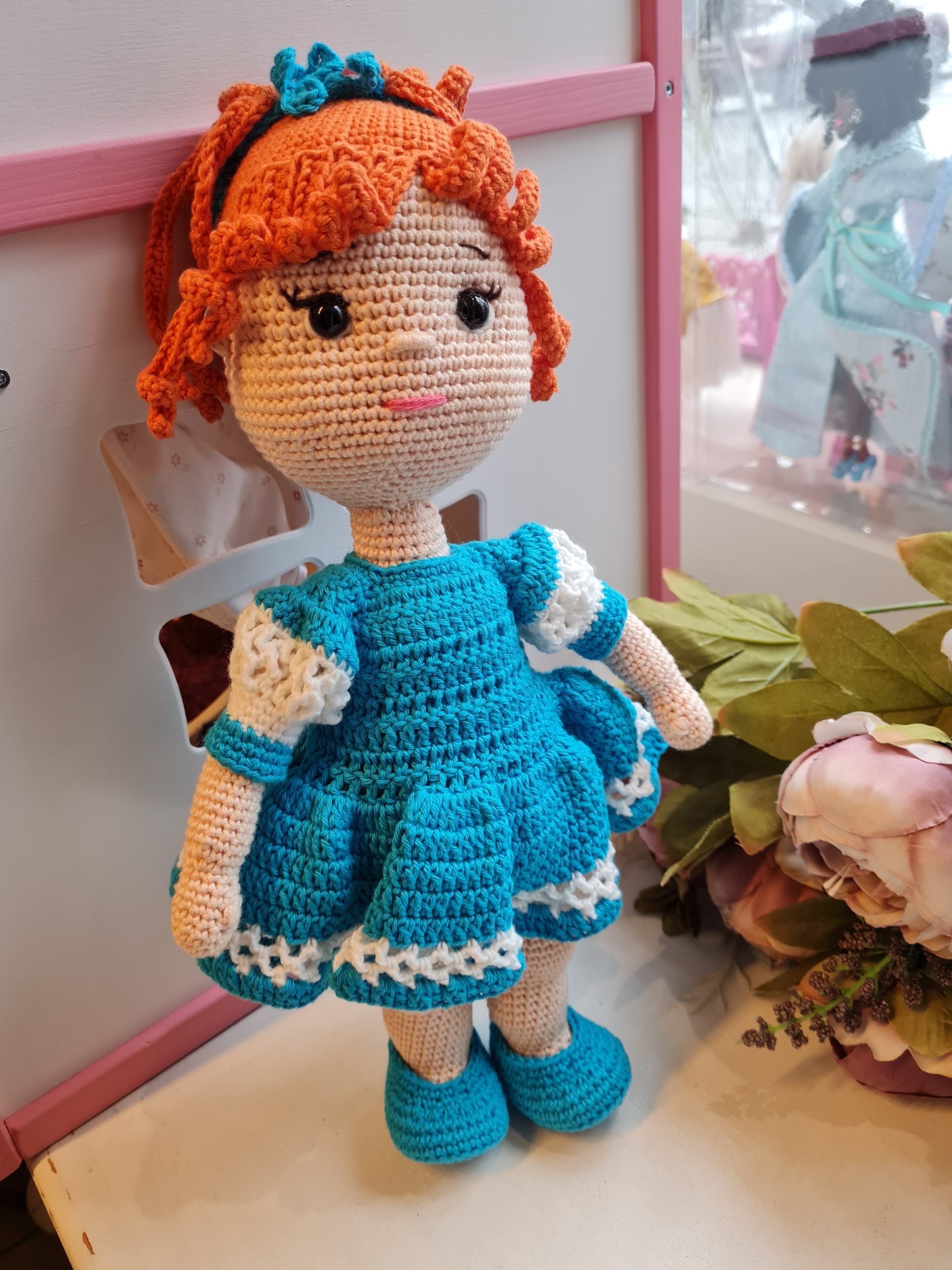 Crocheted doll "Girl in a blue dress"