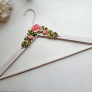 Dress hanger with decorations