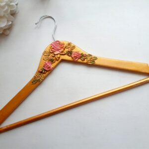 Dress hanger with decorations