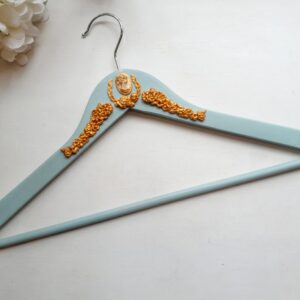 Dress hanger with decorations