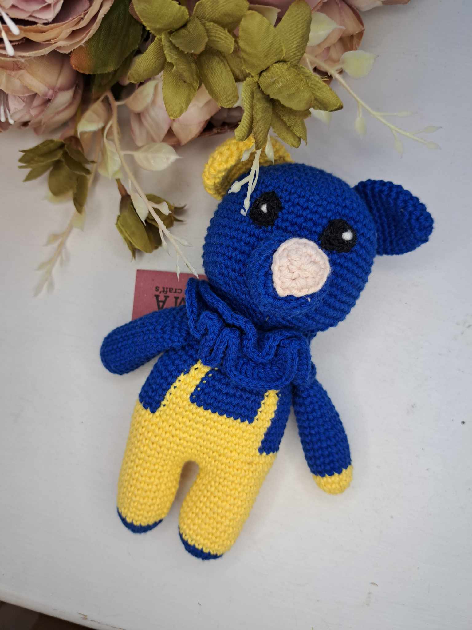 Heegeldatud türkiissinine karu