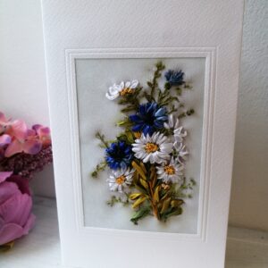 Paeltikandis valminud õnnitluskaart "Rukkililled ja karikakrad"