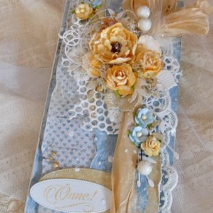 Soojades sinistes ja pruunikates toonides õnnitluskaart koos rahataskuga