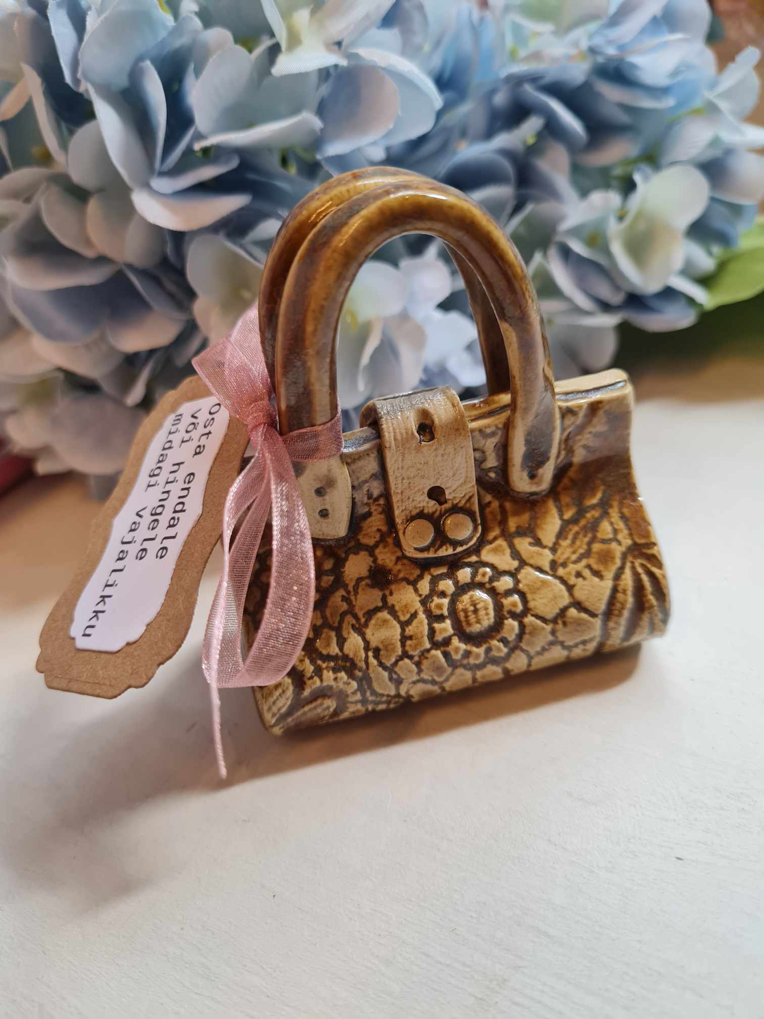 Keraamiline kott raha kinkimiseks, pruun