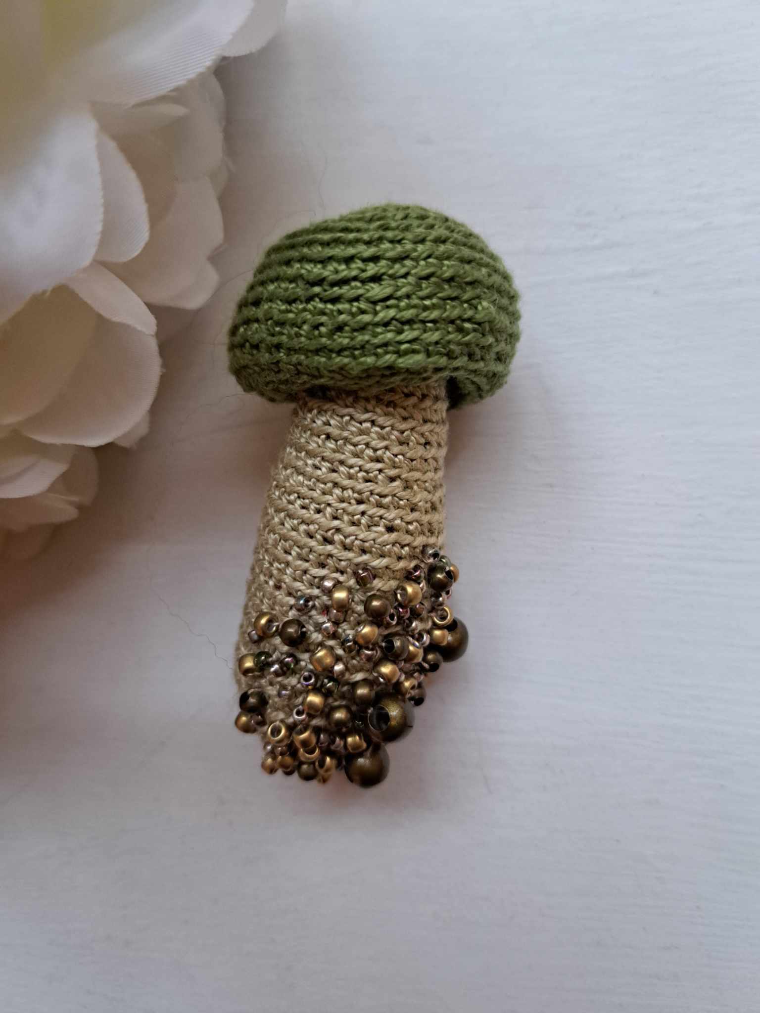 Seenepross pärlikestega