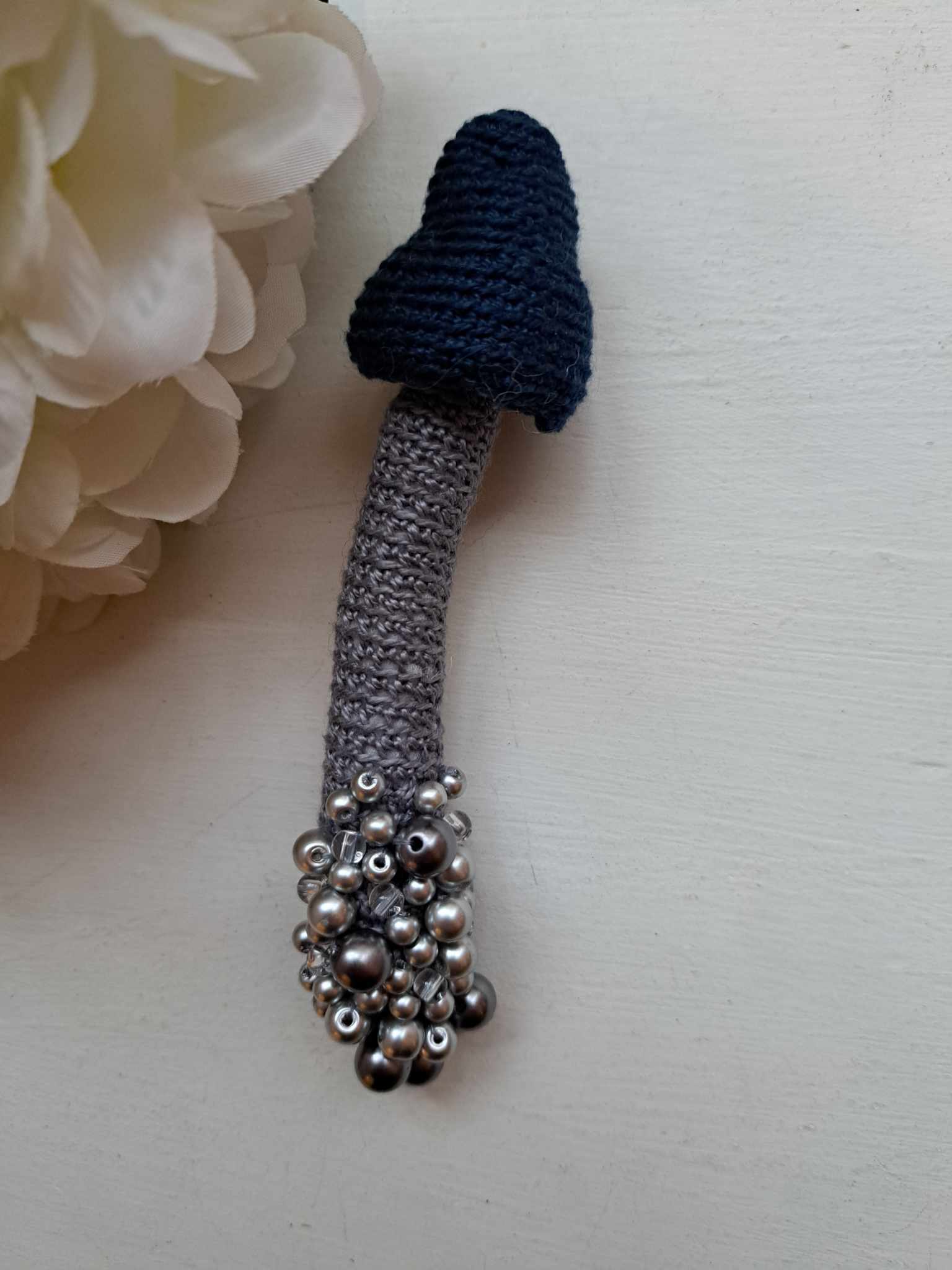 Seenepross pärlikestega