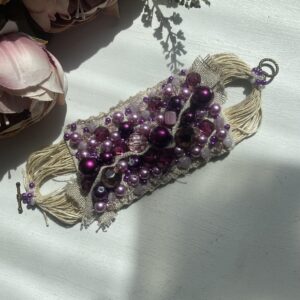 Käsitsi meisterdatud romantiline käeehe, lillades toonides