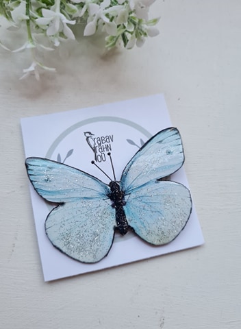 Valge liblikakujuline pross