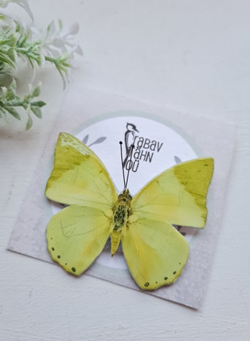 Kollakas roheline liblikakujuline pross