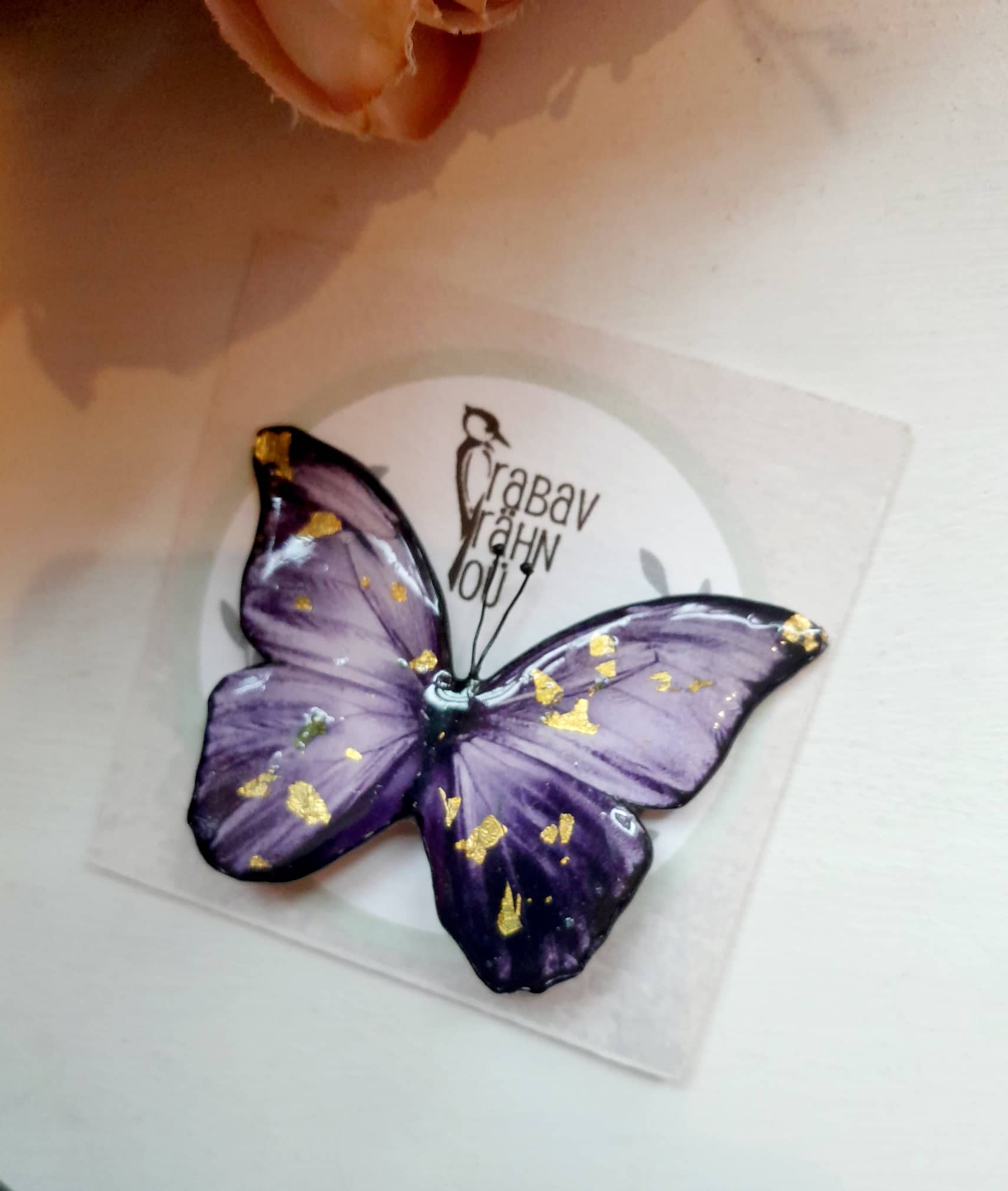 Käsitsi meisterdatud liblikakujuline pross